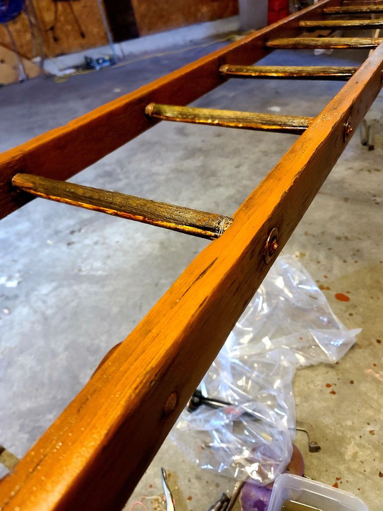 Refinished antique ladder for Rough Cut Social product display.